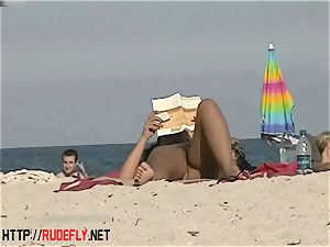 super-fucking-hot babes filmed lounging on a naturist beach