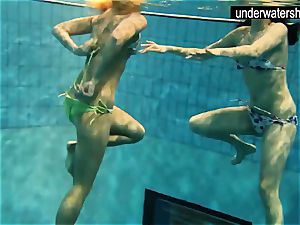 two sumptuous amateurs flashing their bodies off under water