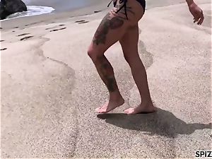 Anna Bell Peaks poking a phat hard-on on the beach